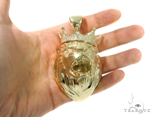 Lion head with crown on sale pendant